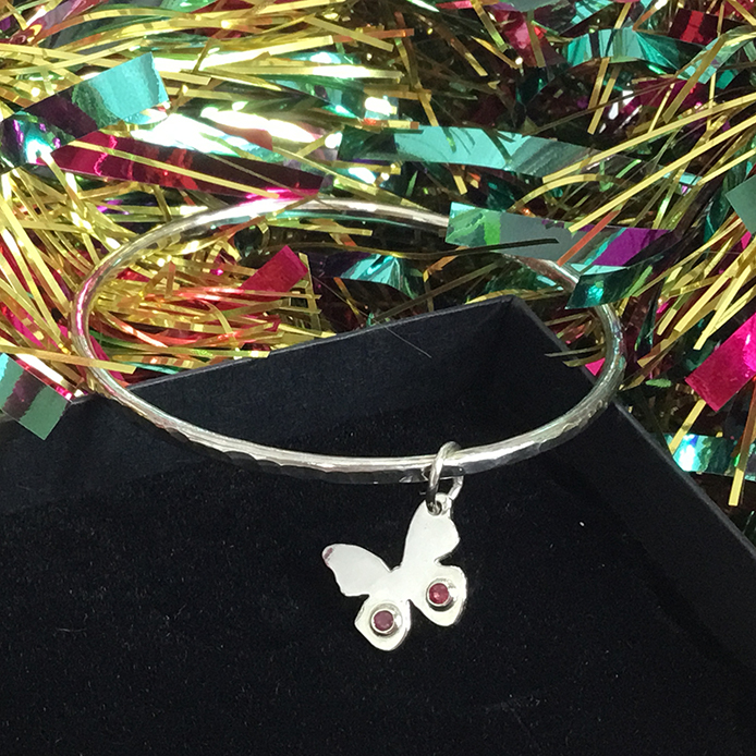 Child's Bangle With Ruby Set Butterfly Pendant