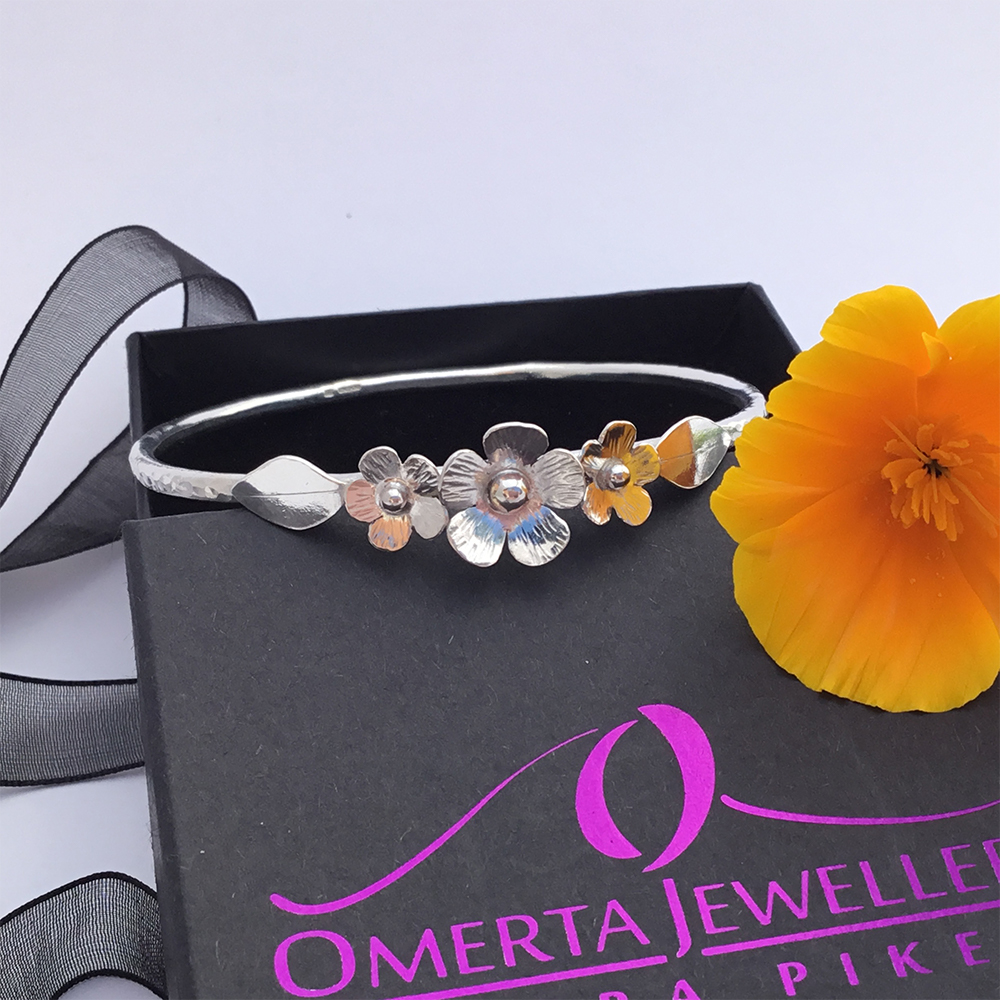 Sterling Silver Hammered Bangle With Flower Garland