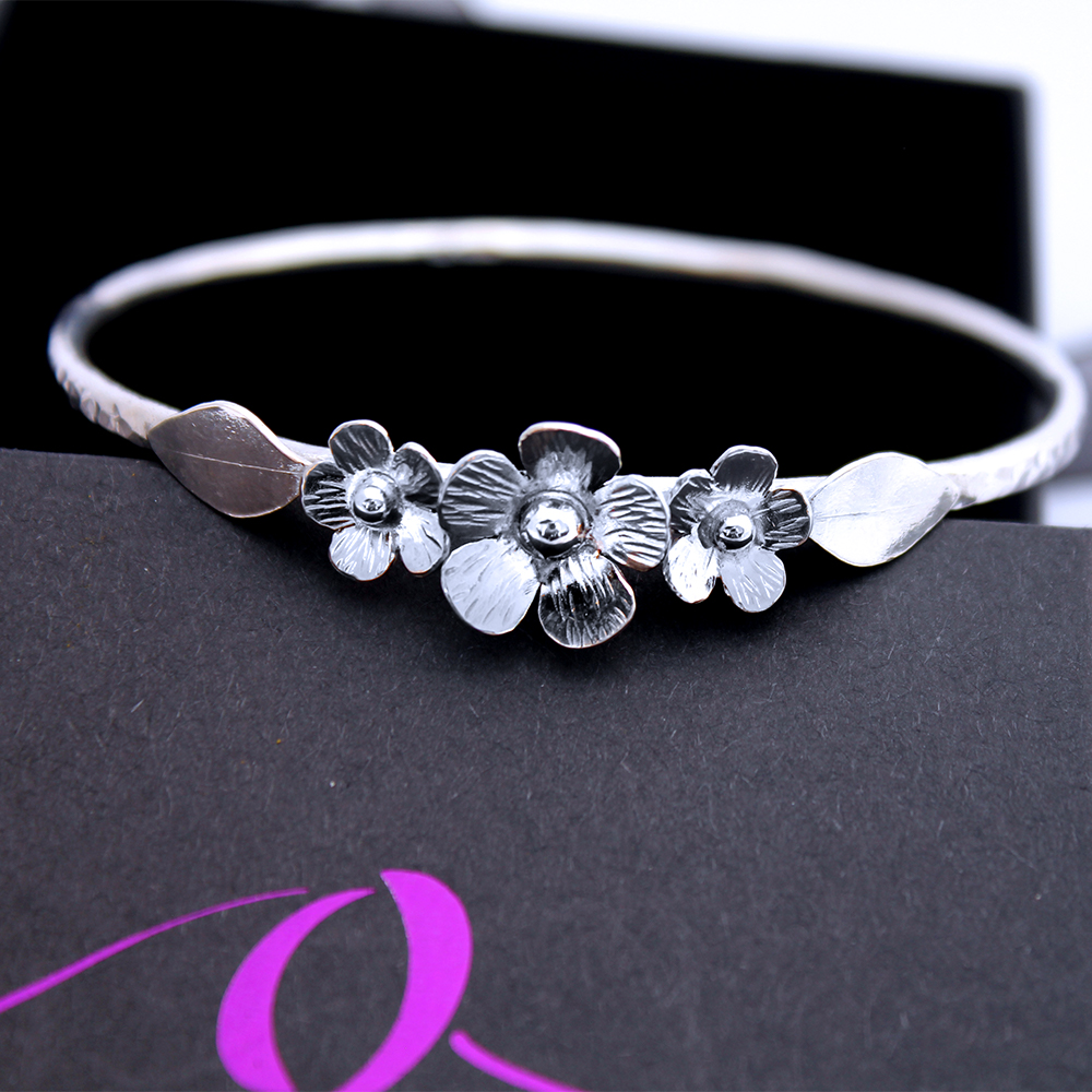 Sterling Silver Hammered Bangle With Flower Garland