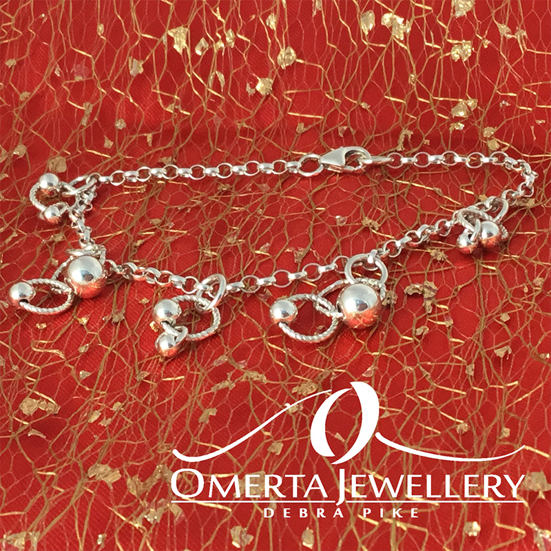 Sterling Silver Chain Bracelet With Orbital Charms